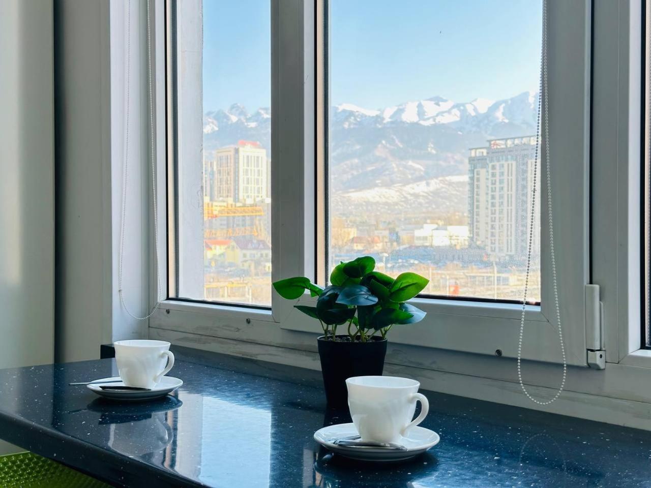 вавилон с видом на горы * Almaty